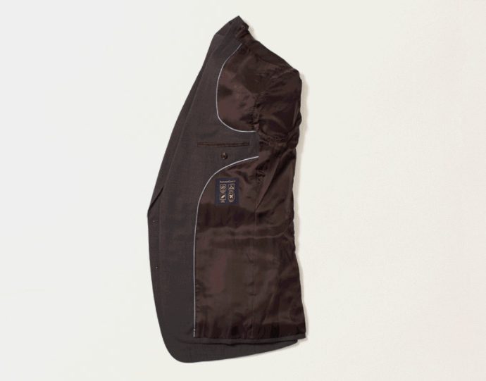Visual instruction on how to fold a suit for packing