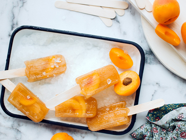 Apricot popsciles on a tray.