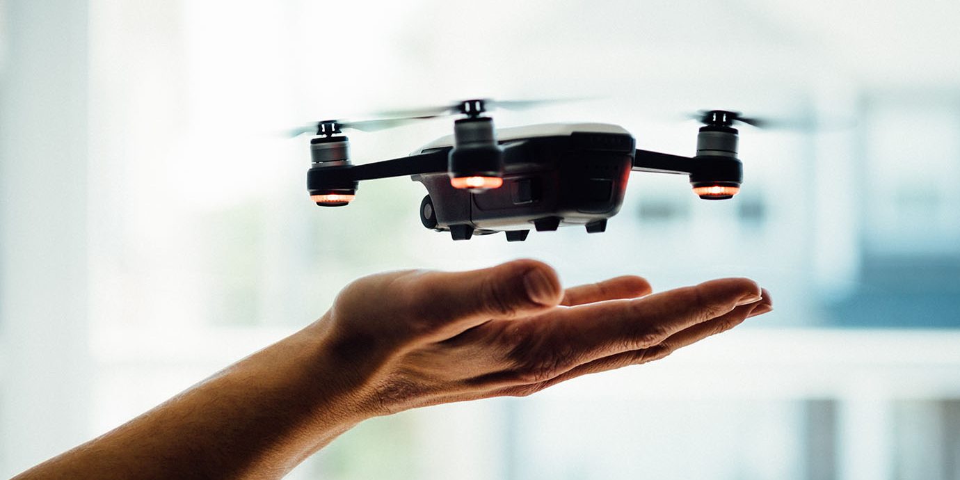 Drone lifting off from someone's hand