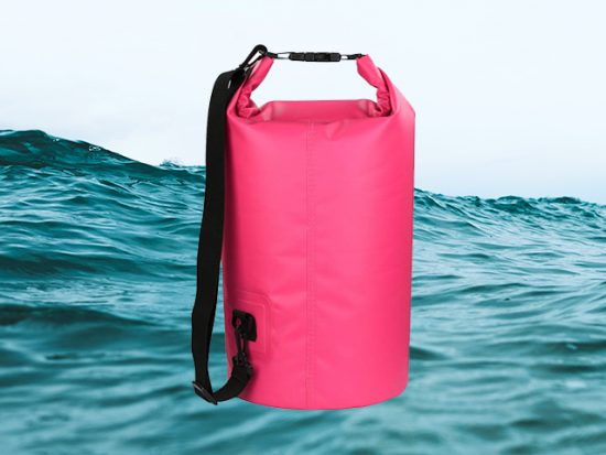 hot pink dry bag with ocean