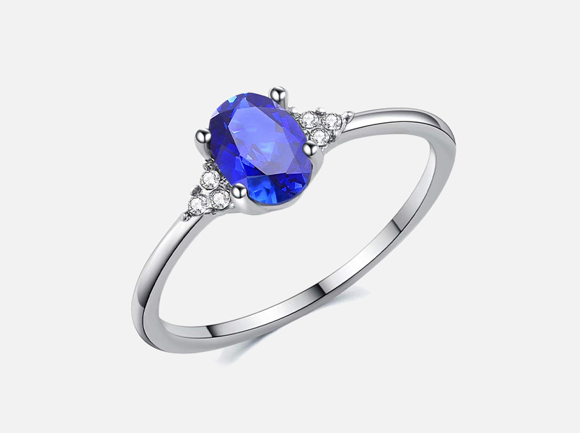 SR Sterling Silver Oval 0.9ct Created Sapphire Solitaire Style Engagement Ring.