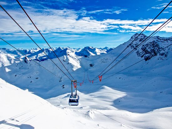 Ski Lift in a Snowy Mountain Range