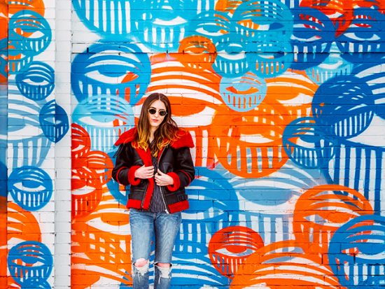 Woman in front of a Mural in Denver