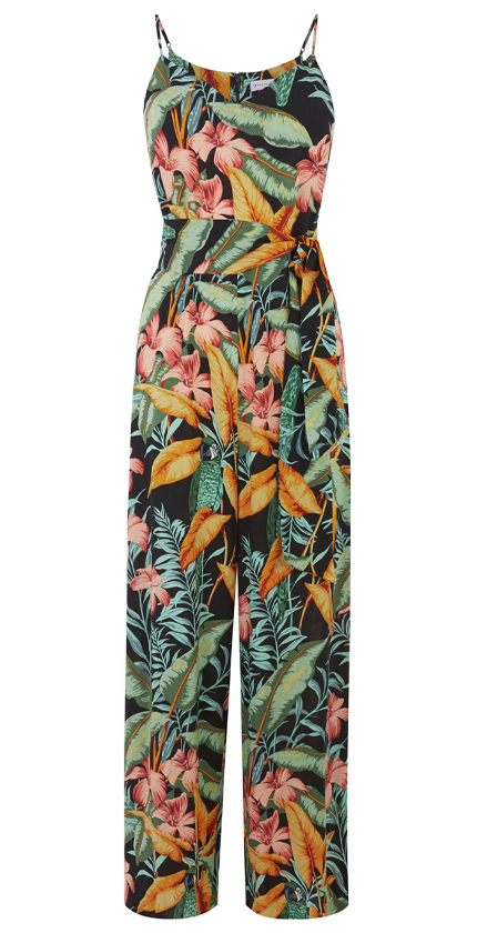 Warehouse cami jumpsuit with belt in tropical print.