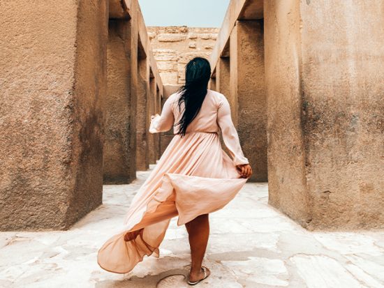 Woman walking through the streets of Cairo.