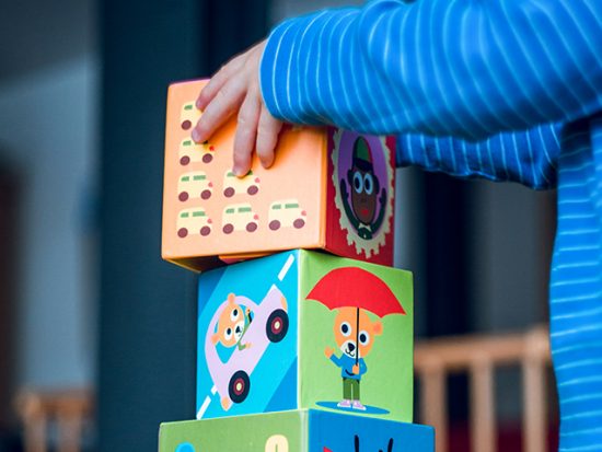 Child building with blocks.