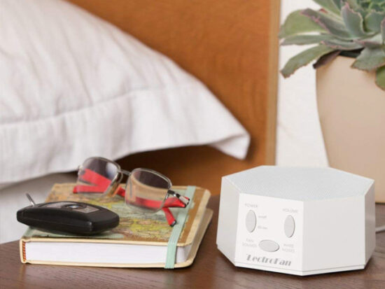 LectroFan High Fidelity White Noise Machine on Bedside Table.