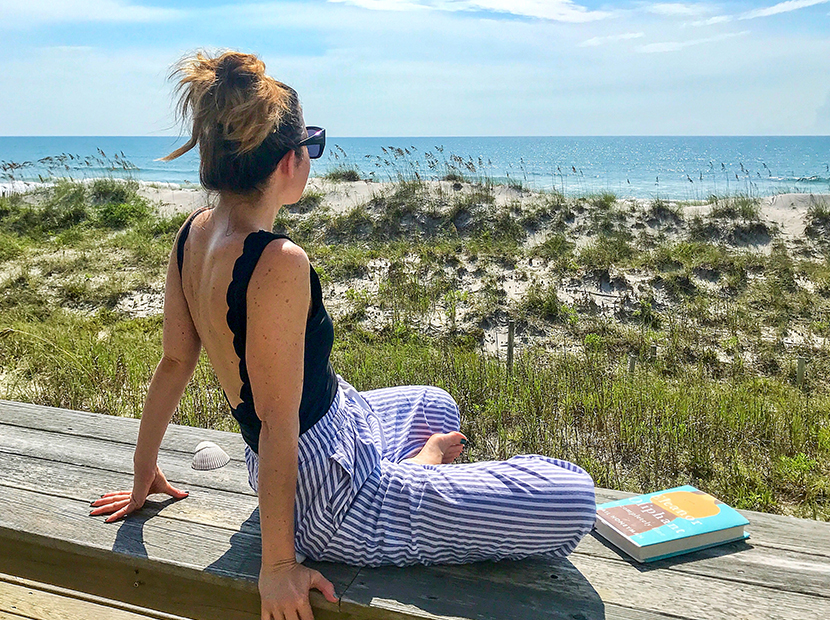 Anne wearing Rent the Runway pants at the beach.