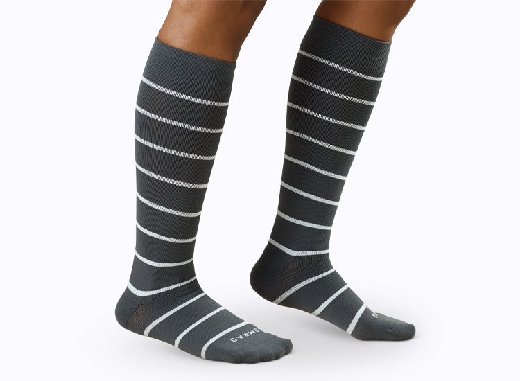 Companion Compression Socks grey with white stripes.